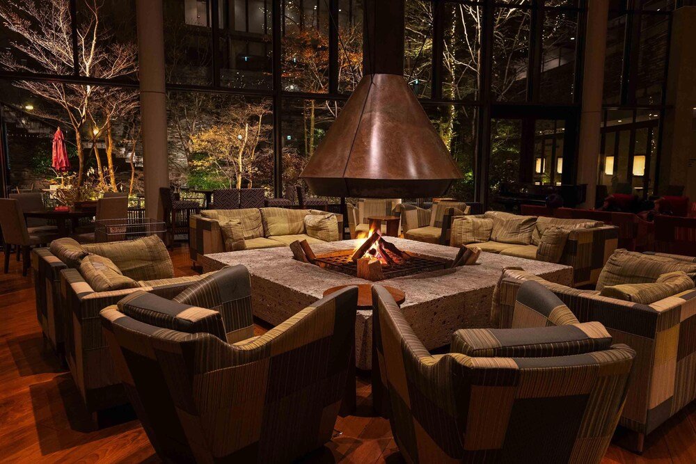 Cozy outdoor seating area with a fire pit at Hyatt Regency Hakone